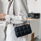 Pösig crossbodyväska