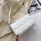 Pösig crossbodyväska