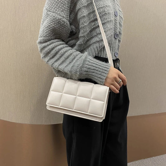 Pösig crossbodyväska